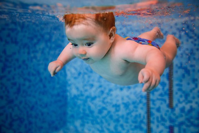 Baby in ionized pool